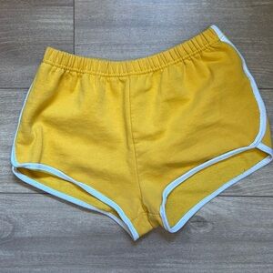 Urban outfitters yellow vintage 70’s gym shorts. Size small.